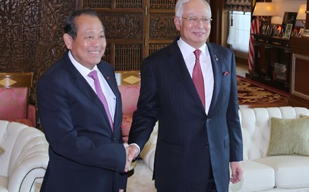 Phó Thủ tướng Thường trực Chính phủ chào xã giao Thủ tướng Malaysia