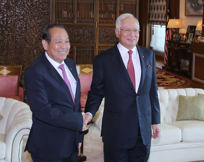 Phó Thủ tướng Thường trực Chính phủ chào xã giao Thủ tướng Malaysia - ảnh 1