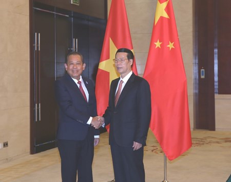 Phó Thủ tướng Trương Hòa Bình hội kiến Phó Thủ tướng Quốc vụ viện Trung Quốc - ảnh 1